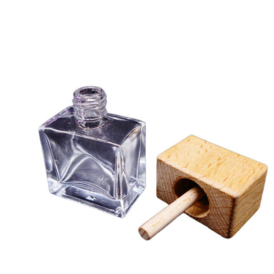 empty bottle of imported perfume recycled glass bottles black blue red pink green cap plastic and metal roll frog
